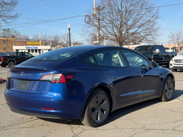 used 2023 Tesla Model 3 car, priced at $29,995