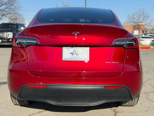 used 2024 Tesla Model Y car, priced at $37,995