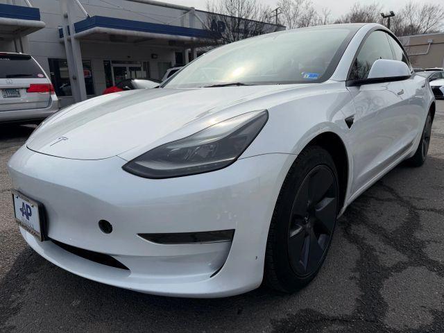 used 2023 Tesla Model 3 car, priced at $27,995