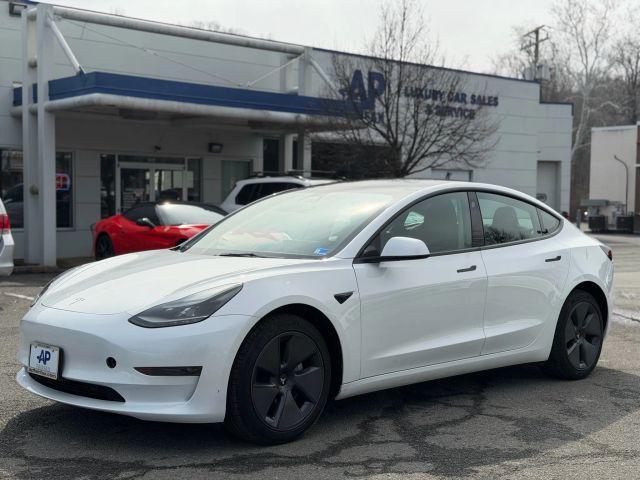 used 2023 Tesla Model 3 car, priced at $27,995