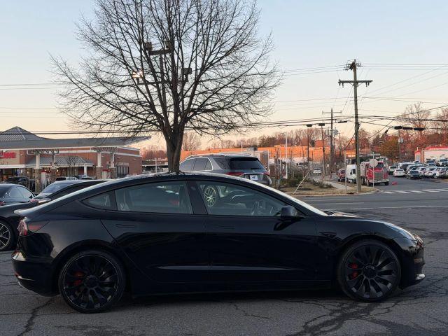 used 2022 Tesla Model 3 car, priced at $22,995