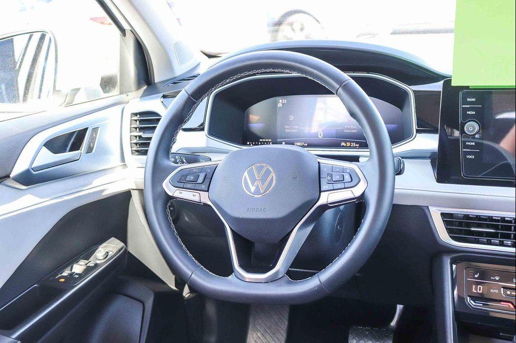 used 2025 Volkswagen Taos car, priced at $24,995