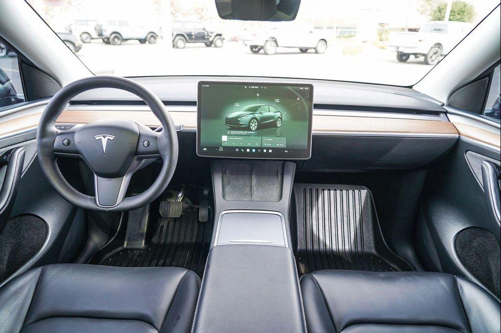 used 2024 Tesla Model Y car, priced at $30,995