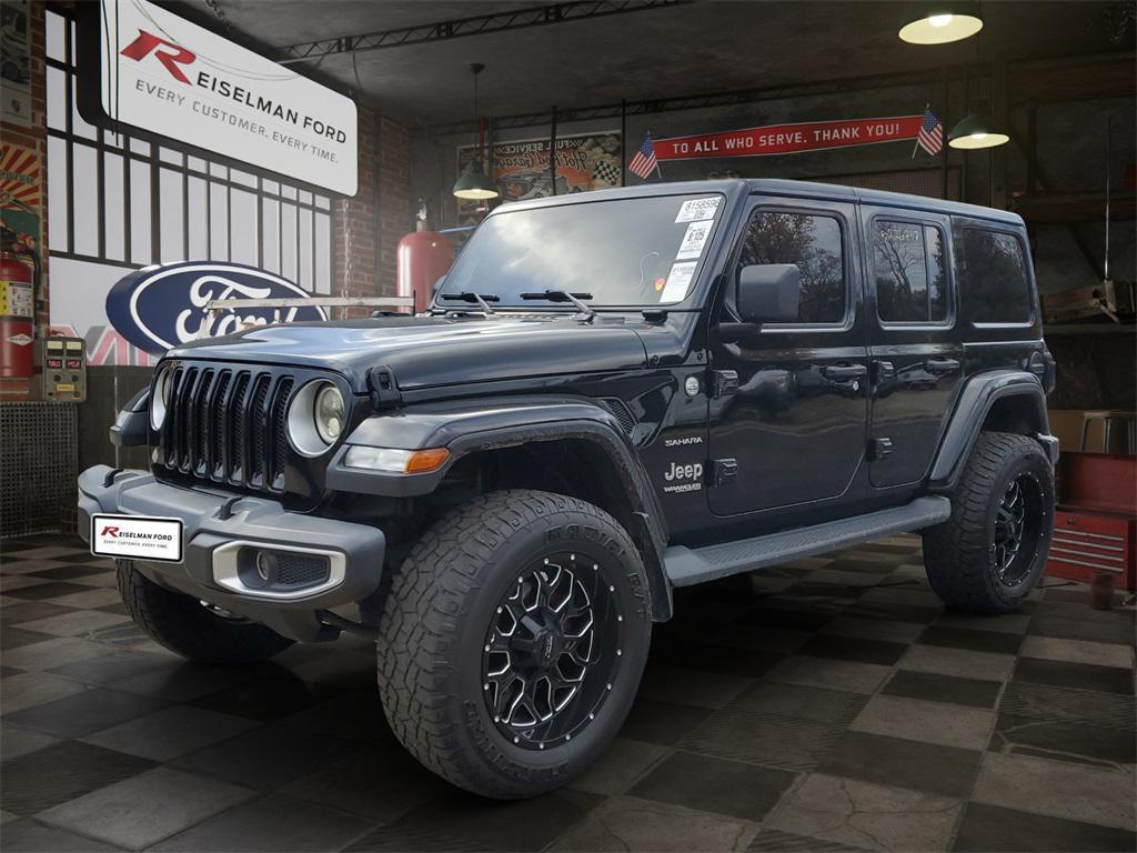 used 2021 Jeep Wrangler Unlimited car, priced at $31,599