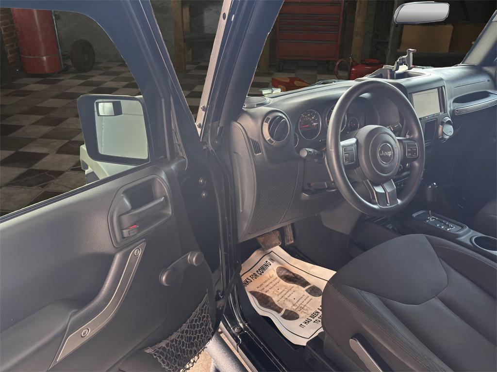 used 2015 Jeep Wrangler car, priced at $17,214