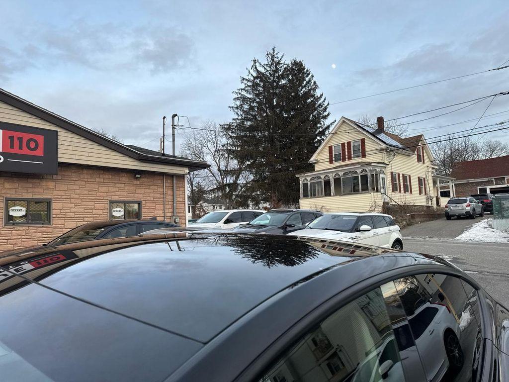 used 2024 Tesla Model Y car, priced at $29,990