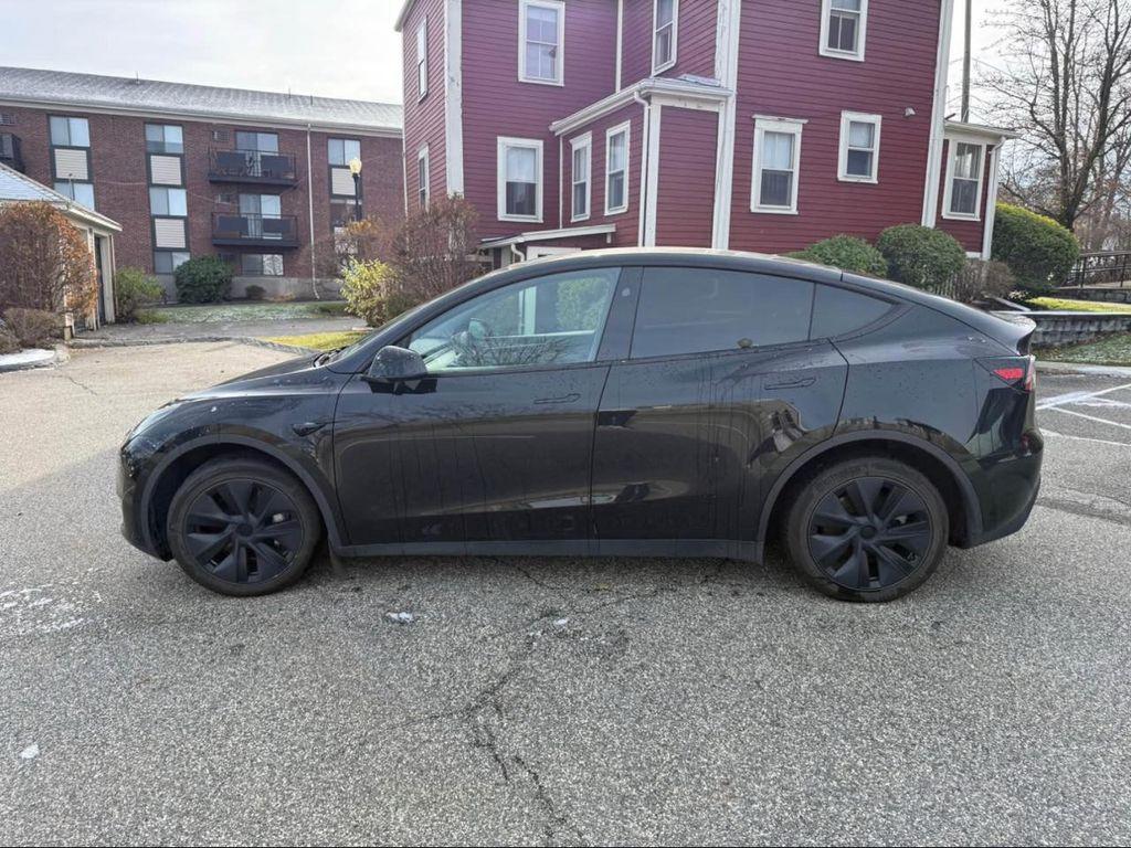 used 2024 Tesla Model Y car, priced at $29,990