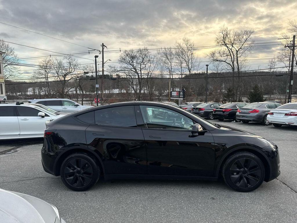used 2024 Tesla Model Y car, priced at $29,990