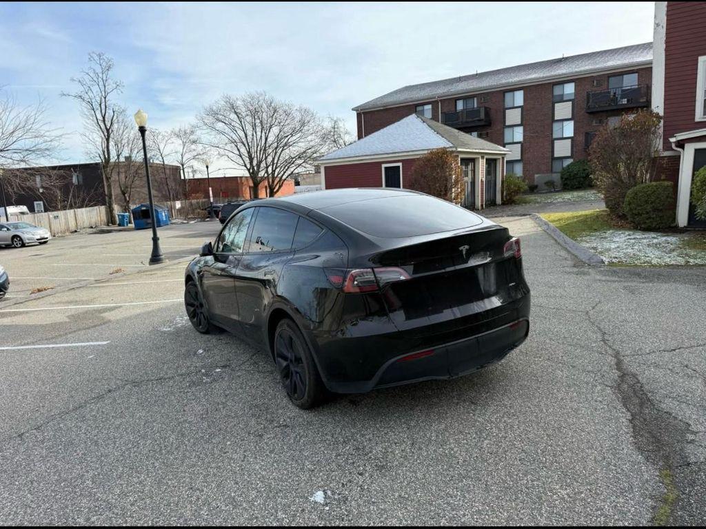 used 2024 Tesla Model Y car, priced at $29,990