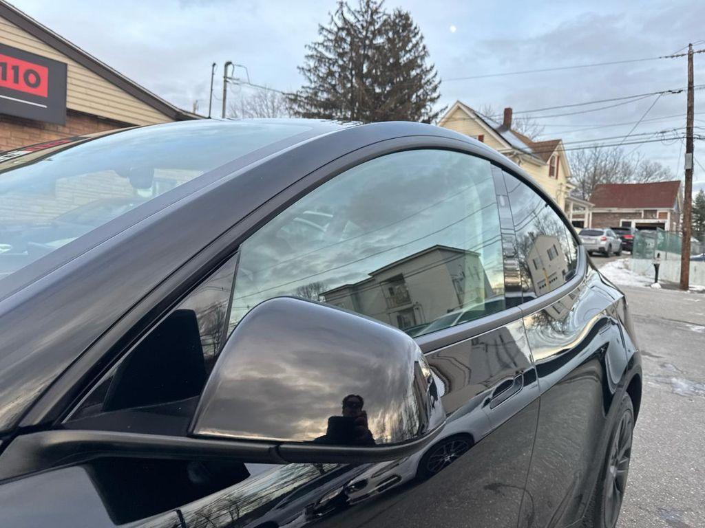 used 2024 Tesla Model Y car, priced at $29,990