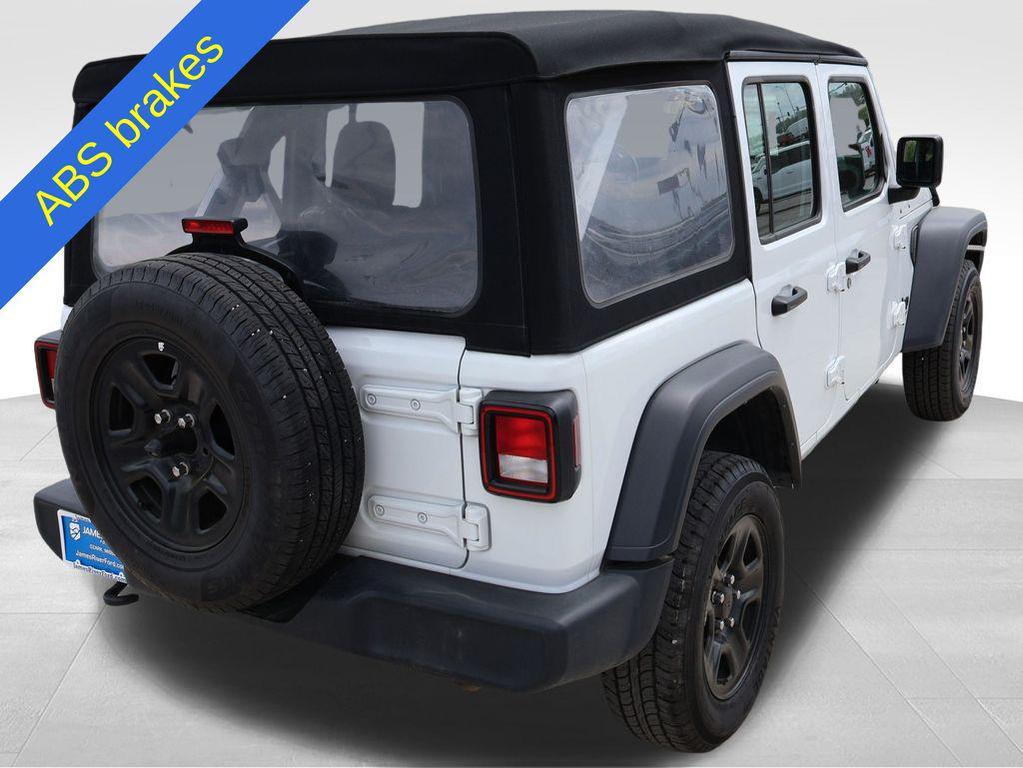 used 2024 Jeep Wrangler car, priced at $27,311