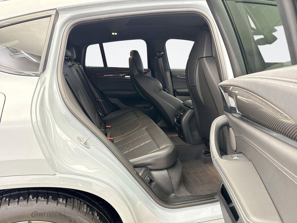 used 2024 BMW X4 M car, priced at $65,898