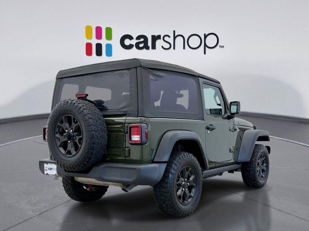 used 2023 Jeep Wrangler car, priced at $28,299