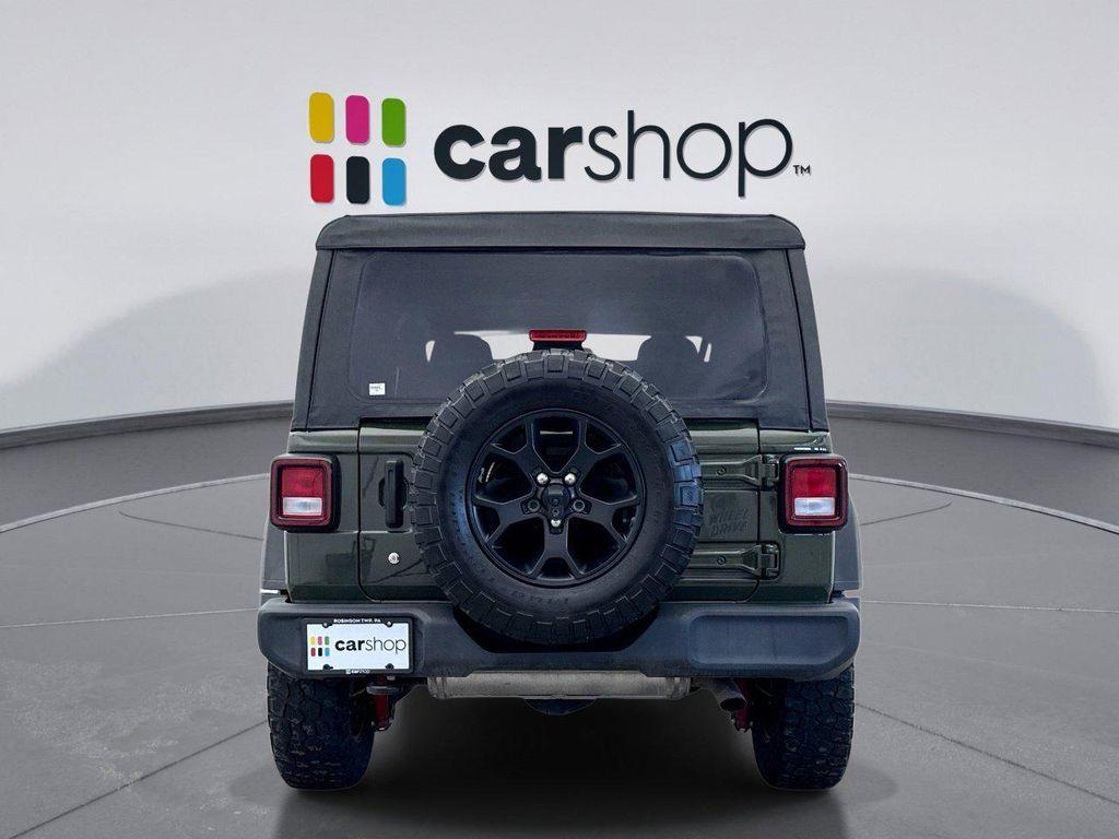 used 2023 Jeep Wrangler car, priced at $28,299
