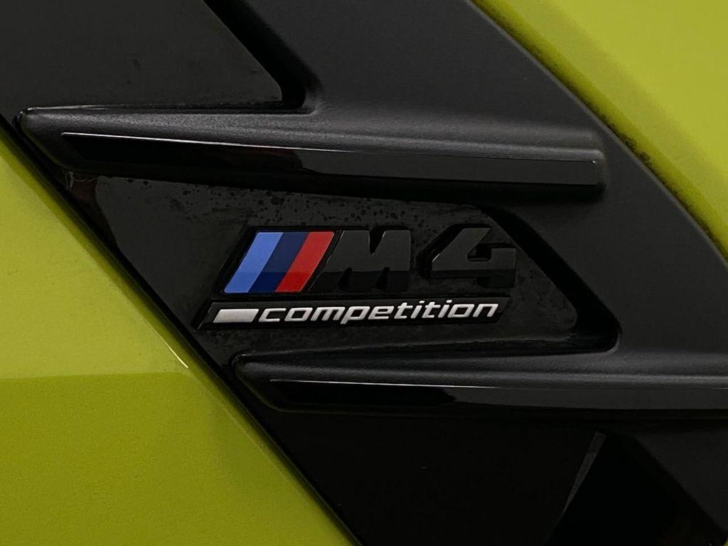 used 2024 BMW M4 car, priced at $76,667