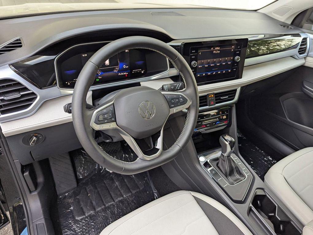 new 2025 Volkswagen Taos car, priced at $30,695
