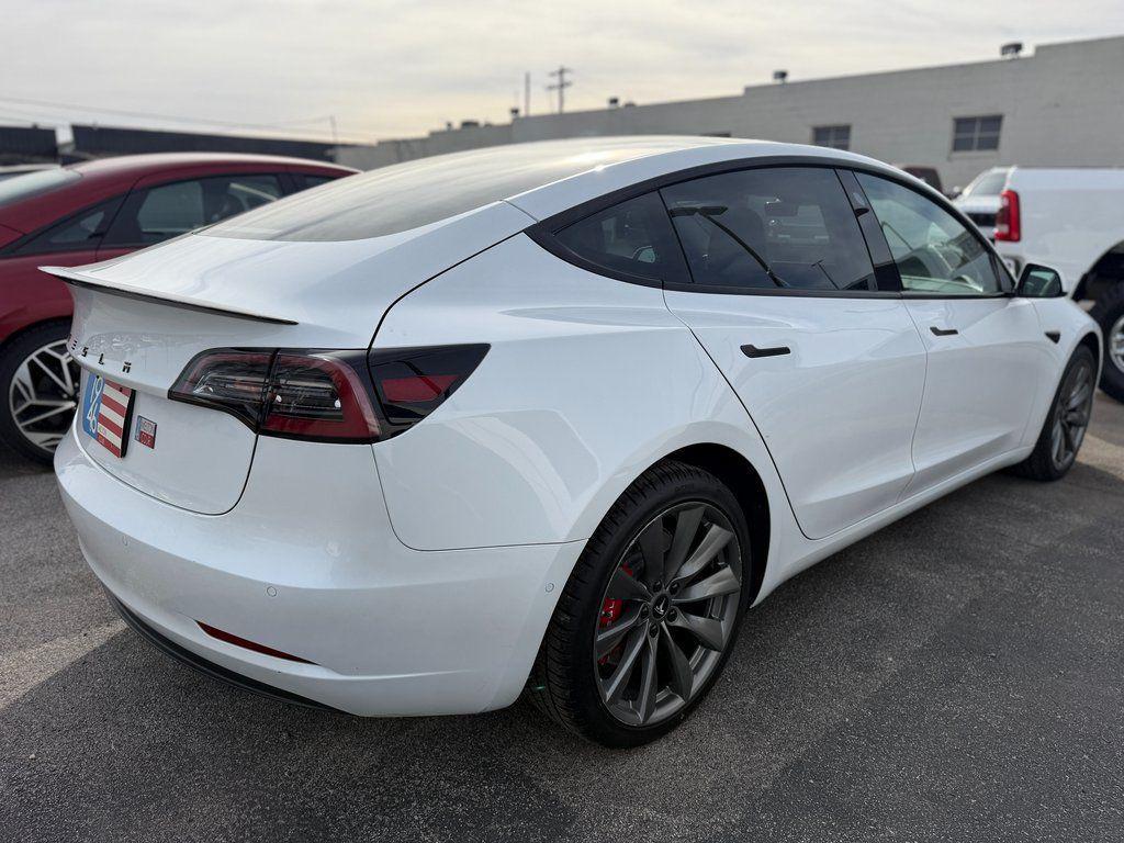 used 2022 Tesla Model 3 car, priced at $17,700