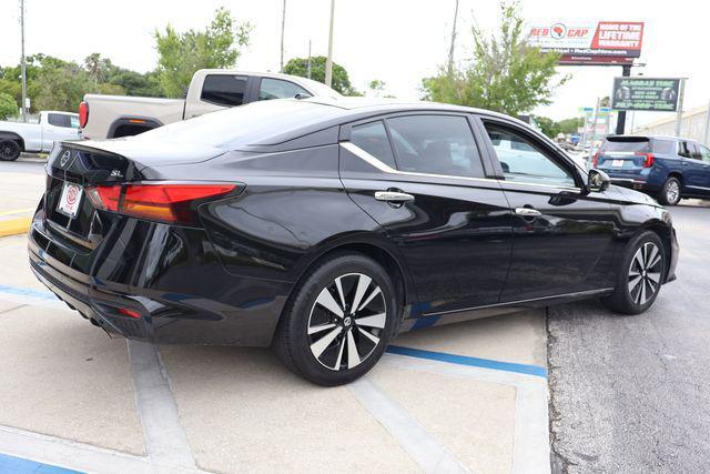 used 2019 Nissan Altima car, priced at $14,000