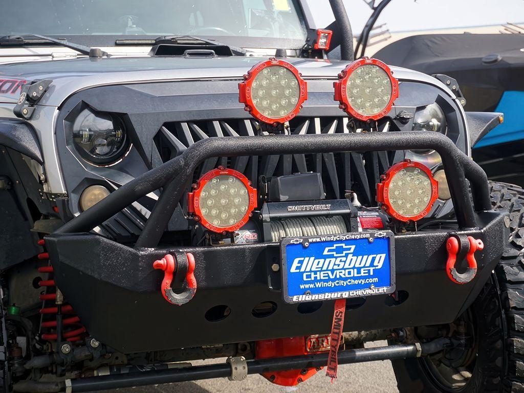 used 2014 Jeep Wrangler Unlimited car, priced at $22,199