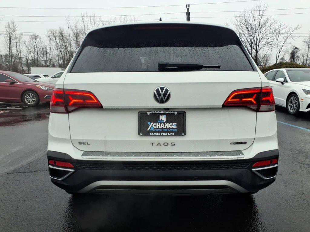 used 2022 Volkswagen Taos car, priced at $14,888