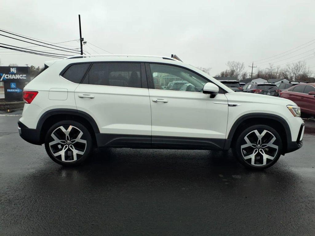 used 2022 Volkswagen Taos car, priced at $14,888