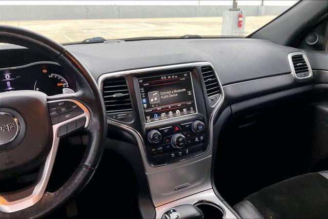 used 2015 Jeep Grand Cherokee car, priced at $10,000