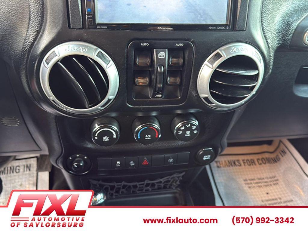 used 2015 Jeep Wrangler Unlimited car, priced at $18,750