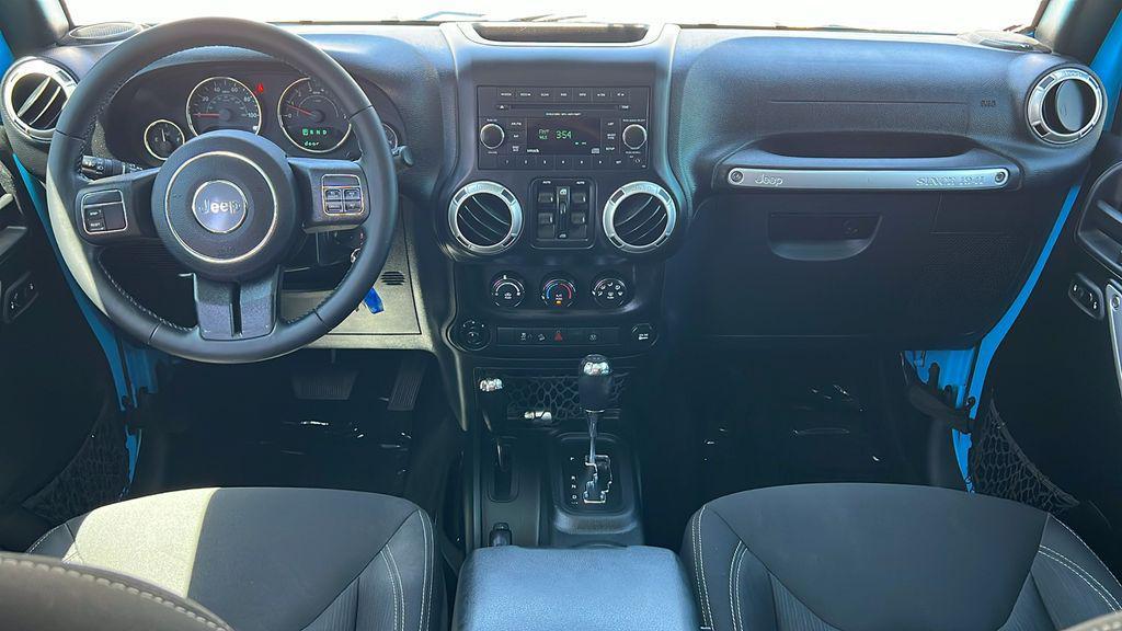 used 2017 Jeep Wrangler Unlimited car, priced at $27,124