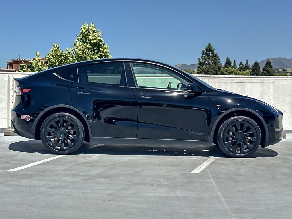 used 2024 Tesla Model Y car, priced at $34,979