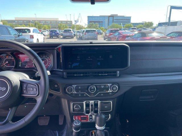 used 2025 Jeep Wrangler car, priced at $38,456