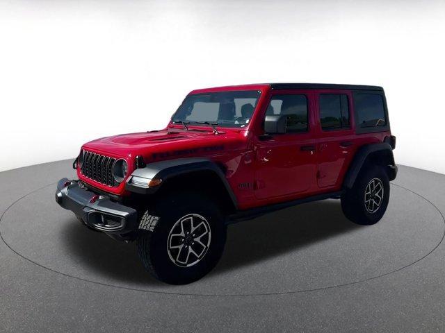 used 2025 Jeep Wrangler car, priced at $38,456