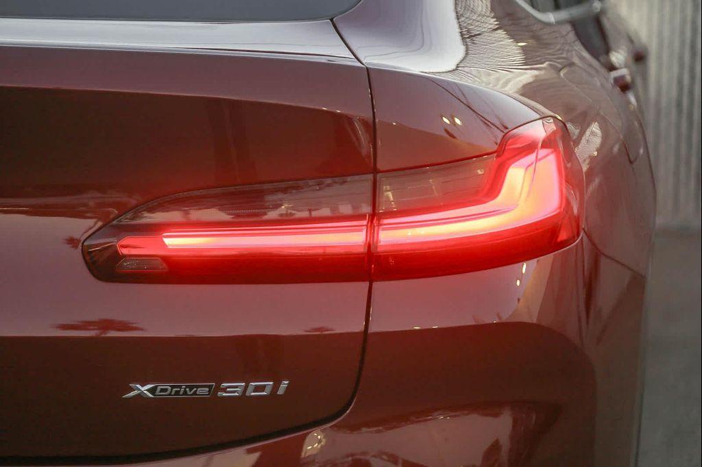 used 2023 BMW X4 car, priced at $39,881