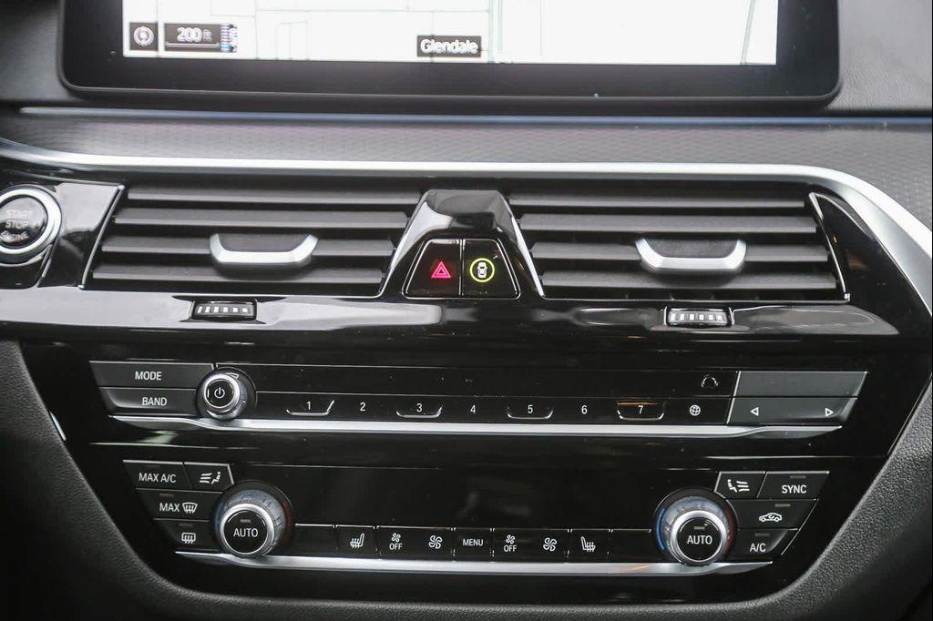 used 2023 BMW 530e car, priced at $34,771