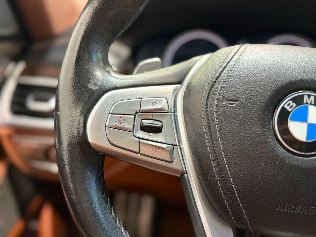 used 2018 BMW 750 car, priced at $27,495