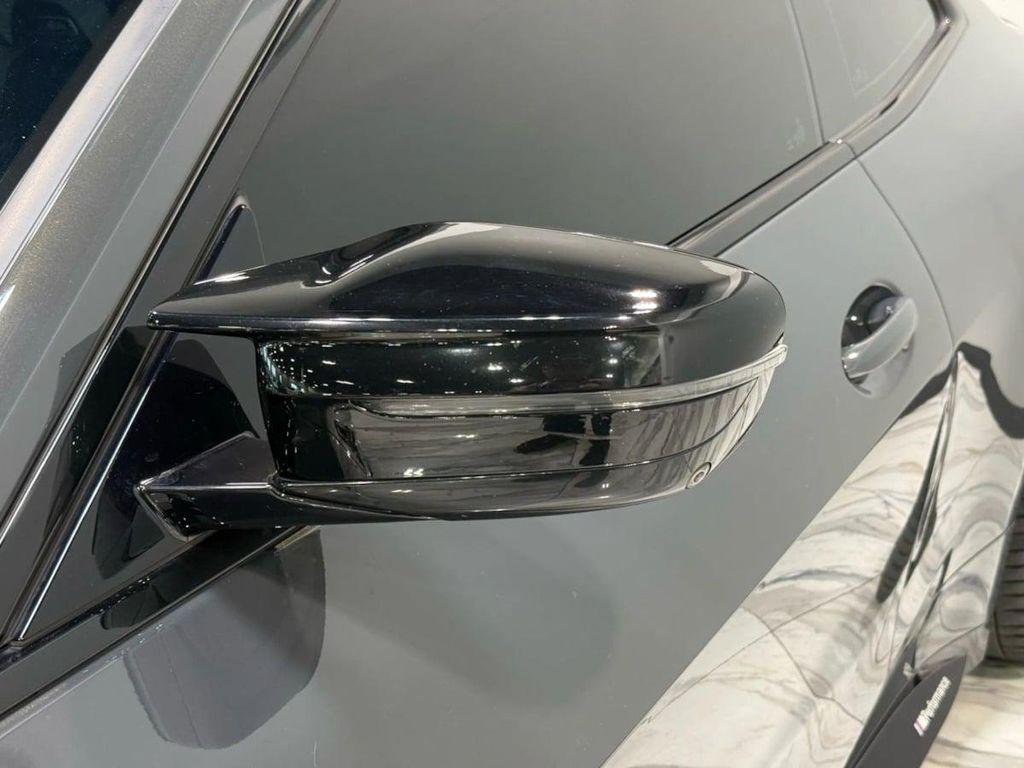 used 2022 BMW M4 car, priced at $61,295