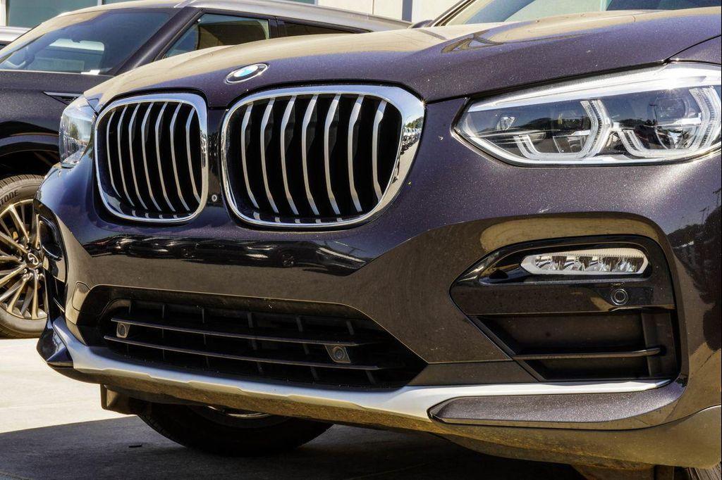 used 2019 BMW X4 car, priced at $25,898