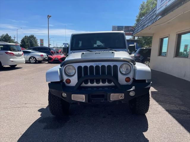 used 2012 Jeep Wrangler Unlimited car, priced at $15,995