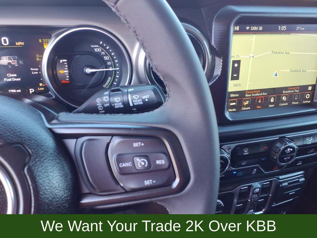 used 2023 Jeep Wrangler 4xe car, priced at $32,339