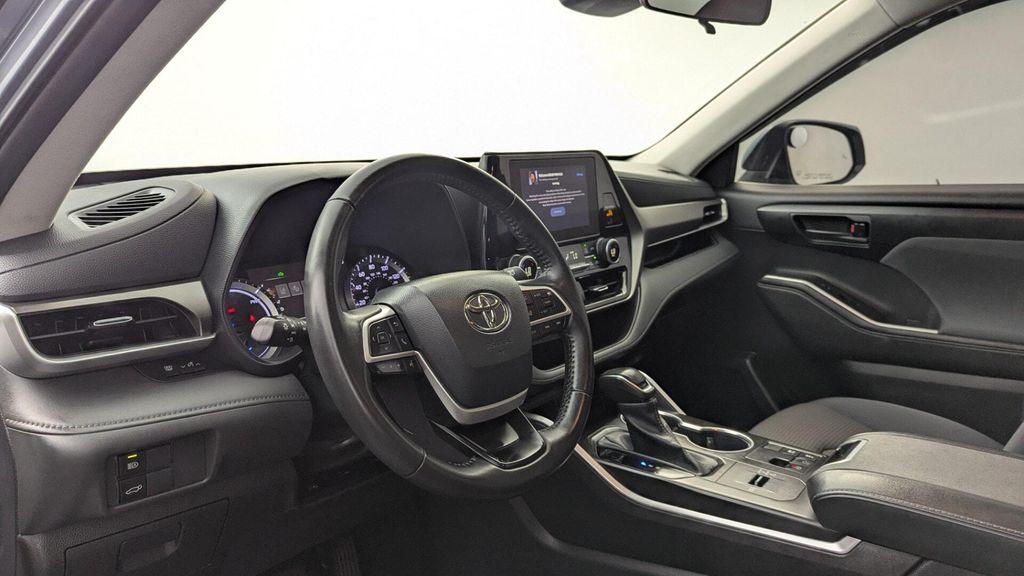 used 2023 Toyota Highlander Hybrid car, priced at $25,999