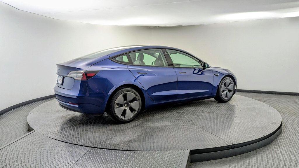 used 2023 Tesla Model 3 car, priced at $22,399