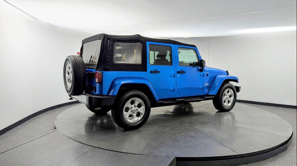 used 2015 Jeep Wrangler Unlimited car, priced at $13,699