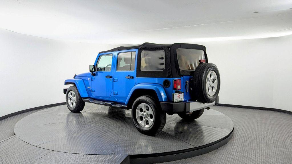 used 2015 Jeep Wrangler Unlimited car, priced at $13,699