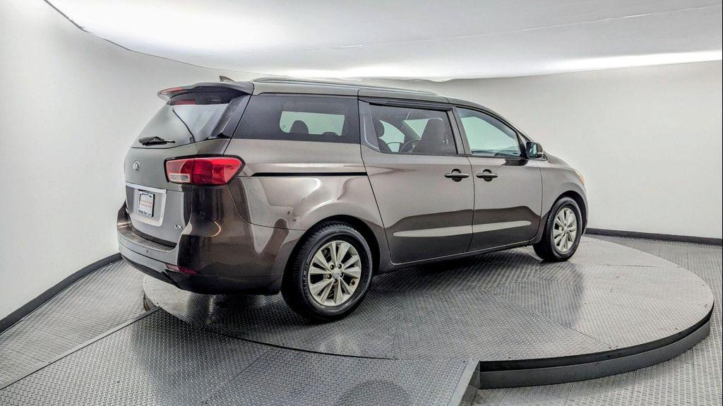 2016 Titanium Bronze Pearl Metallic Kia Sedona