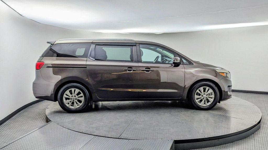 2016 Titanium Bronze Pearl Metallic Kia Sedona