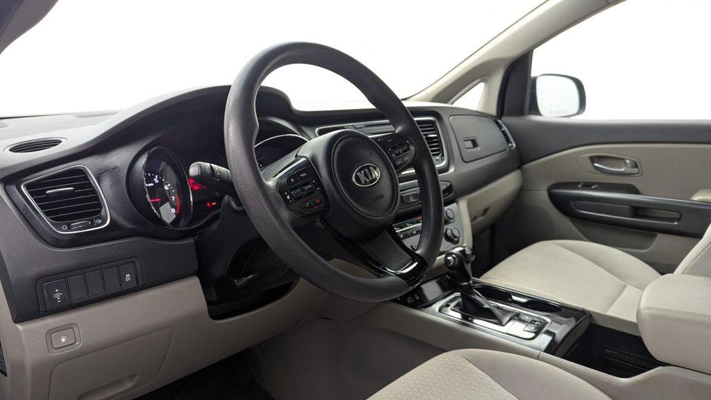 2016 Titanium Bronze Pearl Metallic Kia Sedona