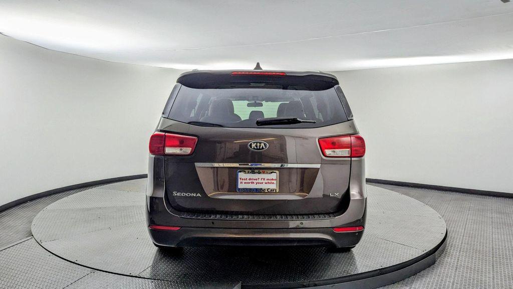 2016 Titanium Bronze Pearl Metallic Kia Sedona