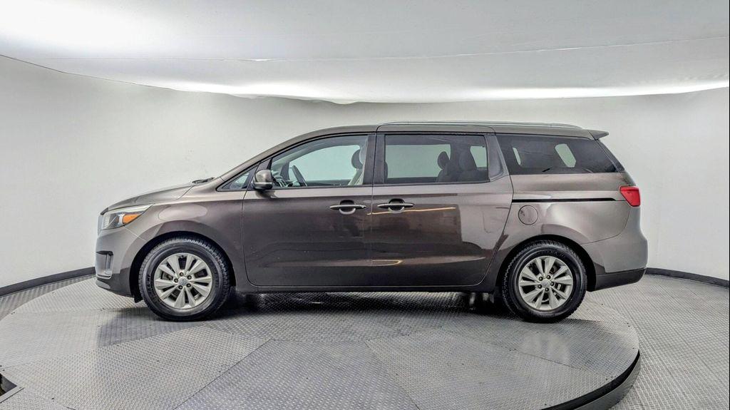2016 Titanium Bronze Pearl Metallic Kia Sedona