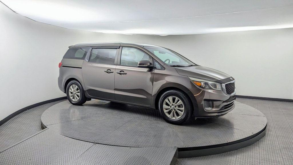 2016 Titanium Bronze Pearl Metallic Kia Sedona