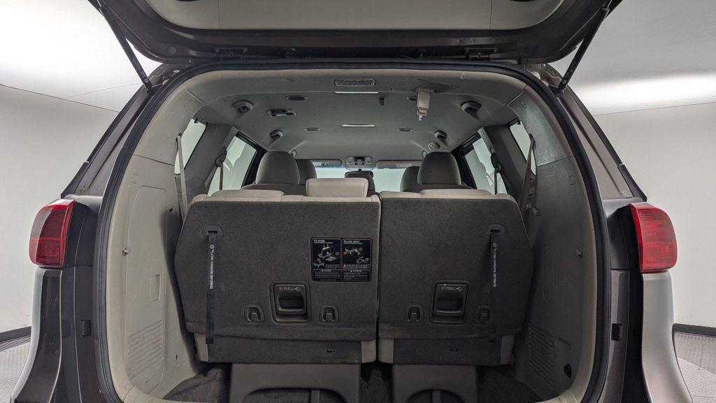 2016 Titanium Bronze Pearl Metallic Kia Sedona