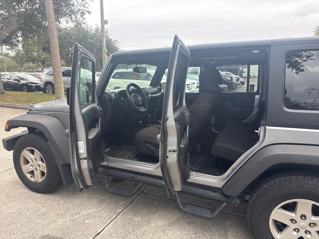 used 2015 Jeep Wrangler Unlimited car, priced at $9,999